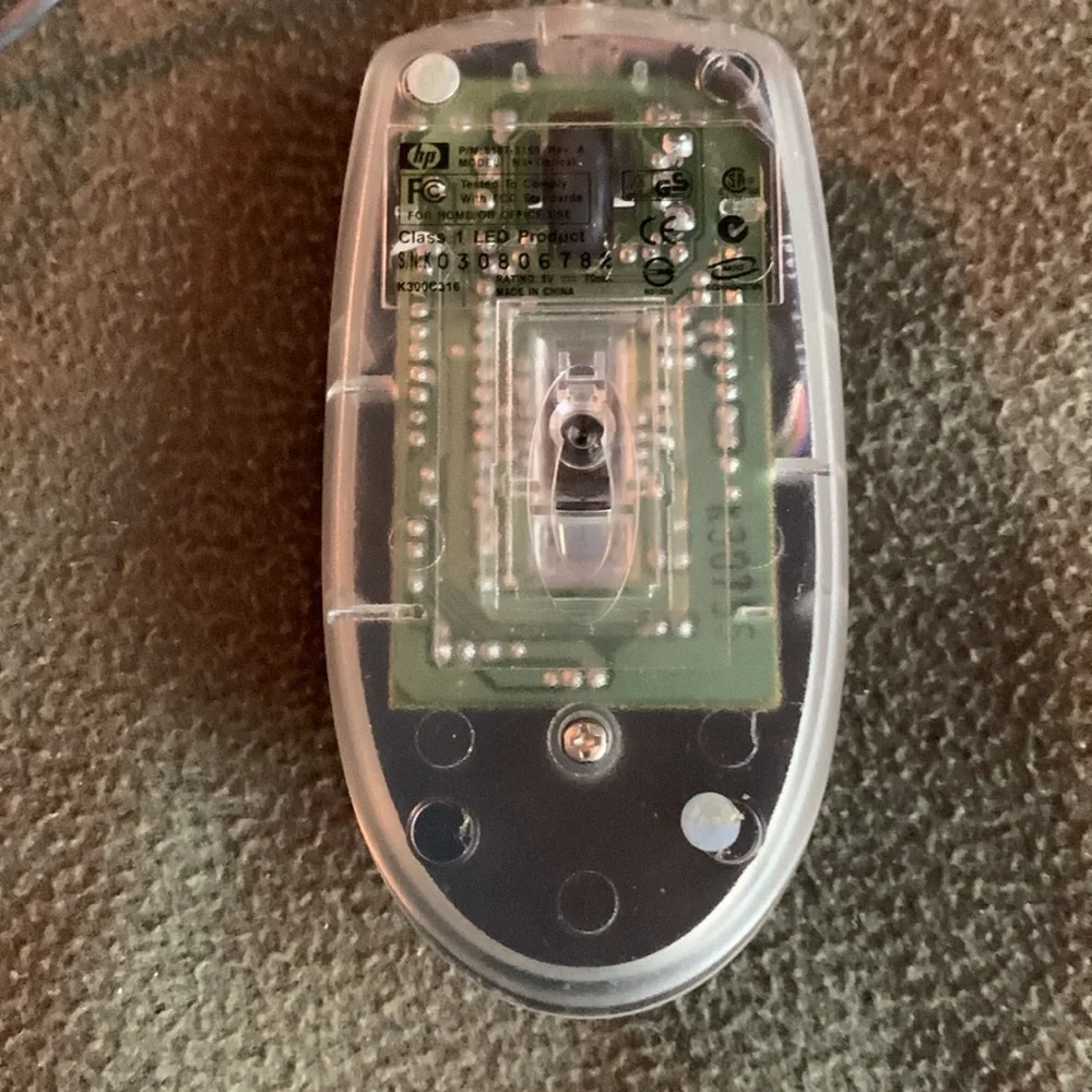 HP computer mouse with cord.